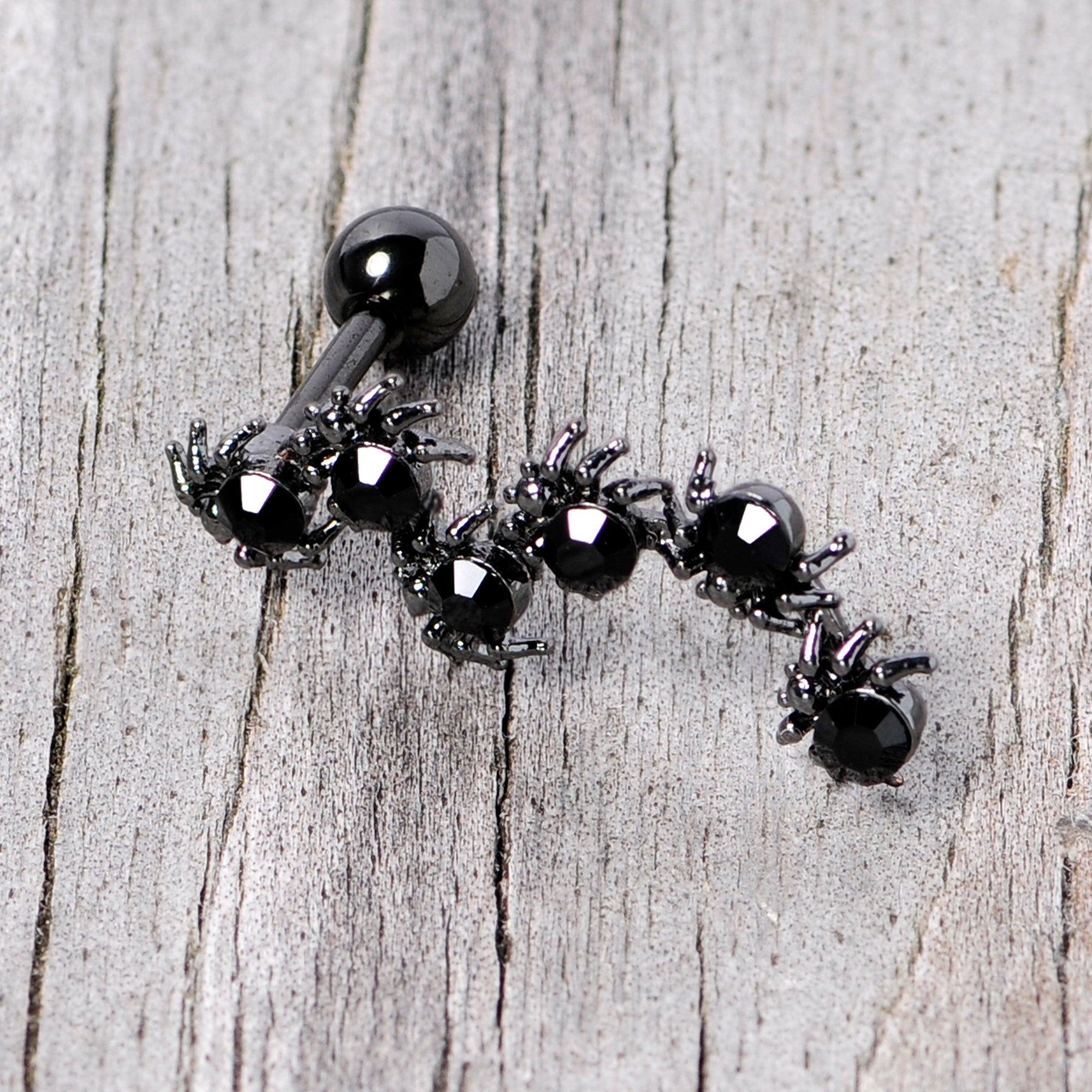 BodyCandy 16G 1/4 Black CZ Gem Black Spider Halloween Cartilage Tragus — lifestyle context
