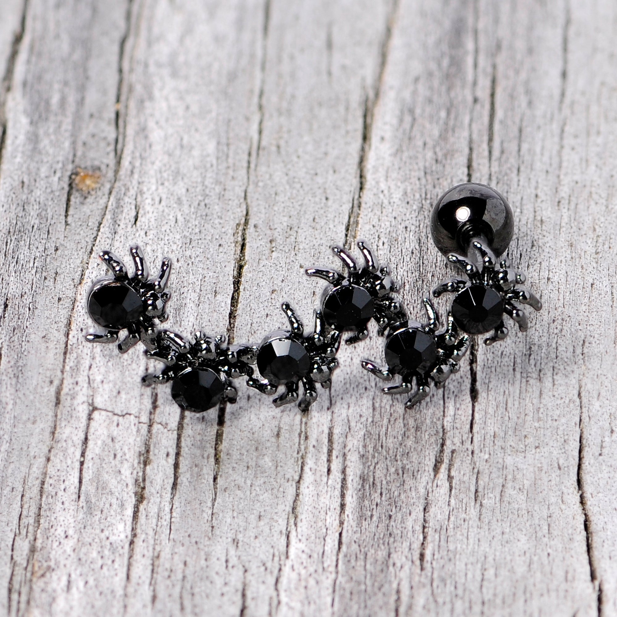 BodyCandy 16G 1/4 Black CZ Gem Black Spider Halloween Cartilage Tragus — side view