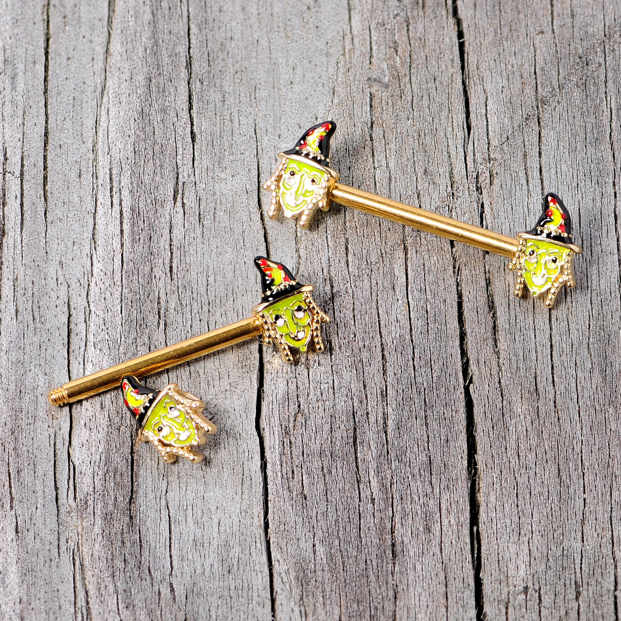 BodyCandy 14G 9/16 Gold Tone Witch Halloween Barbell Nipple Ring Set — side view