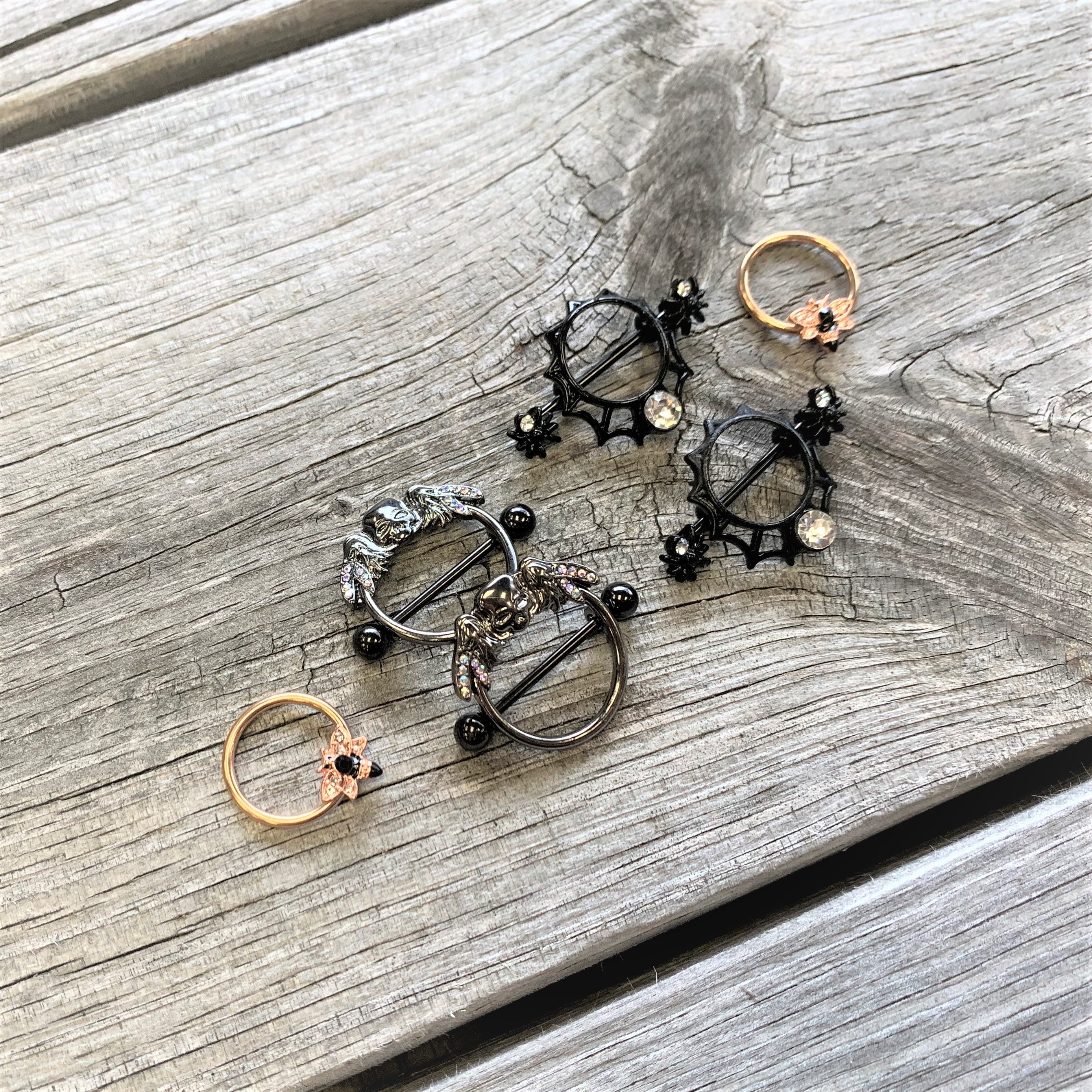BodyCandy 14G 9/16 Clear Gem Black Spider Web Nipple Shield Set — detail close-up