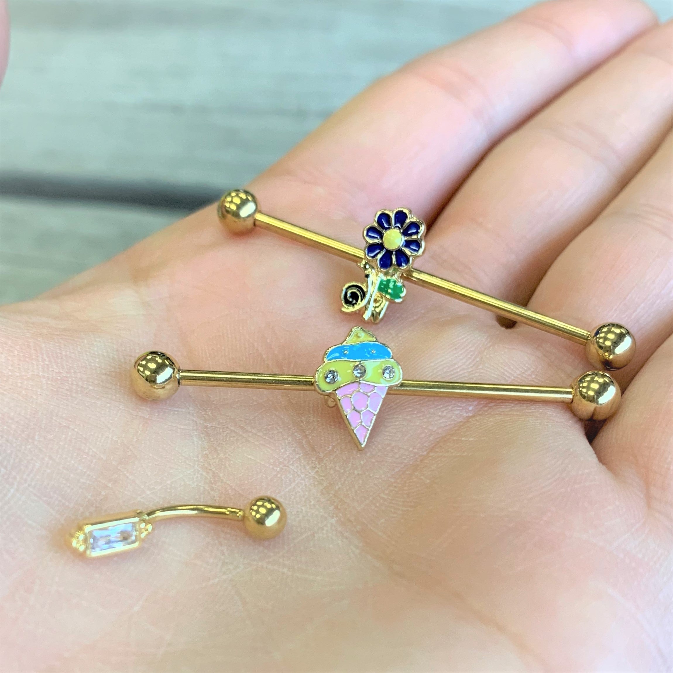 BodyCandy 14G Gold Tone Blue Green Snail Flower Industrial Barbell 38mm — lifestyle context