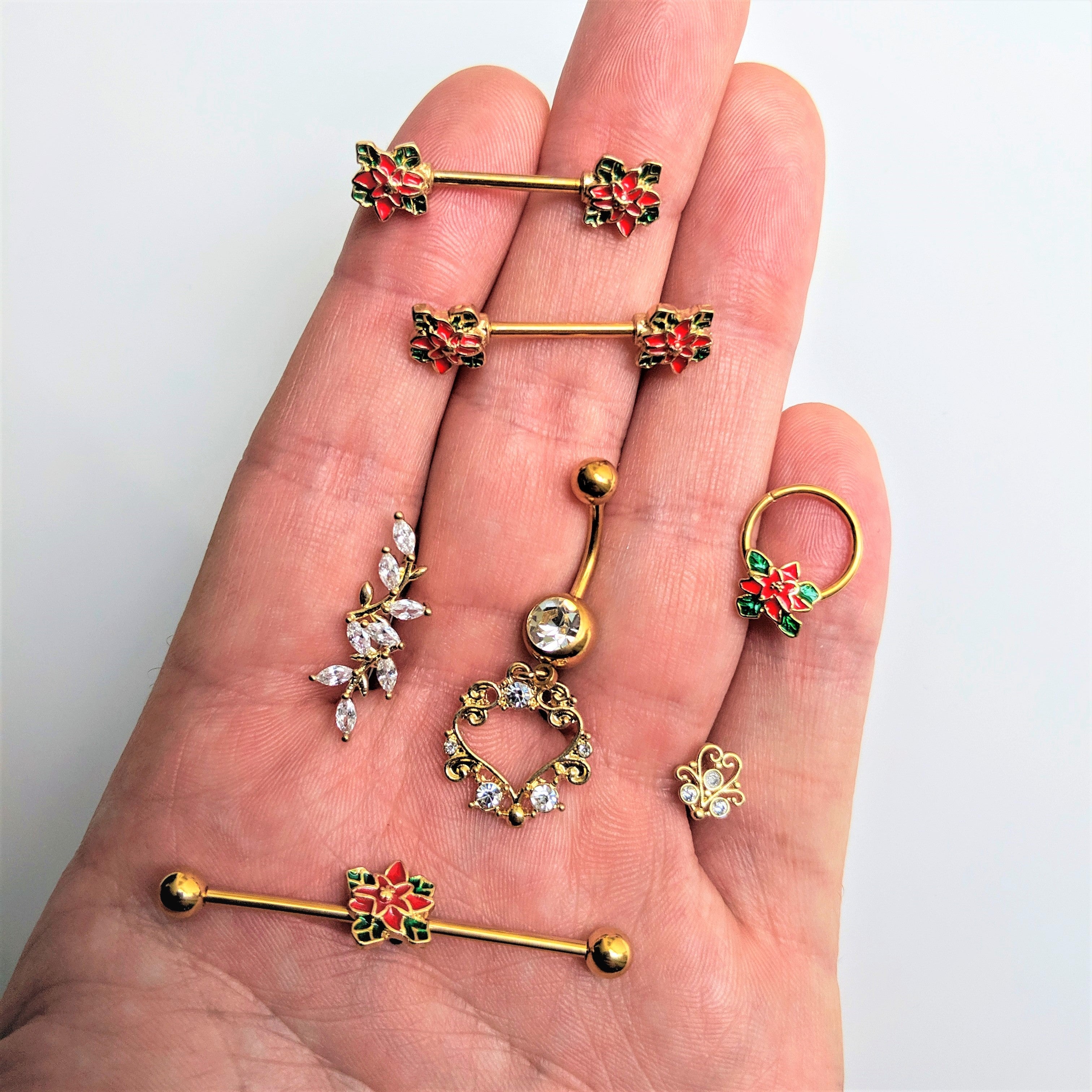 BodyCandy 14G Gold Tone PVD Poinsettia Christmas Industrial Barbell 38mm — detail close-up