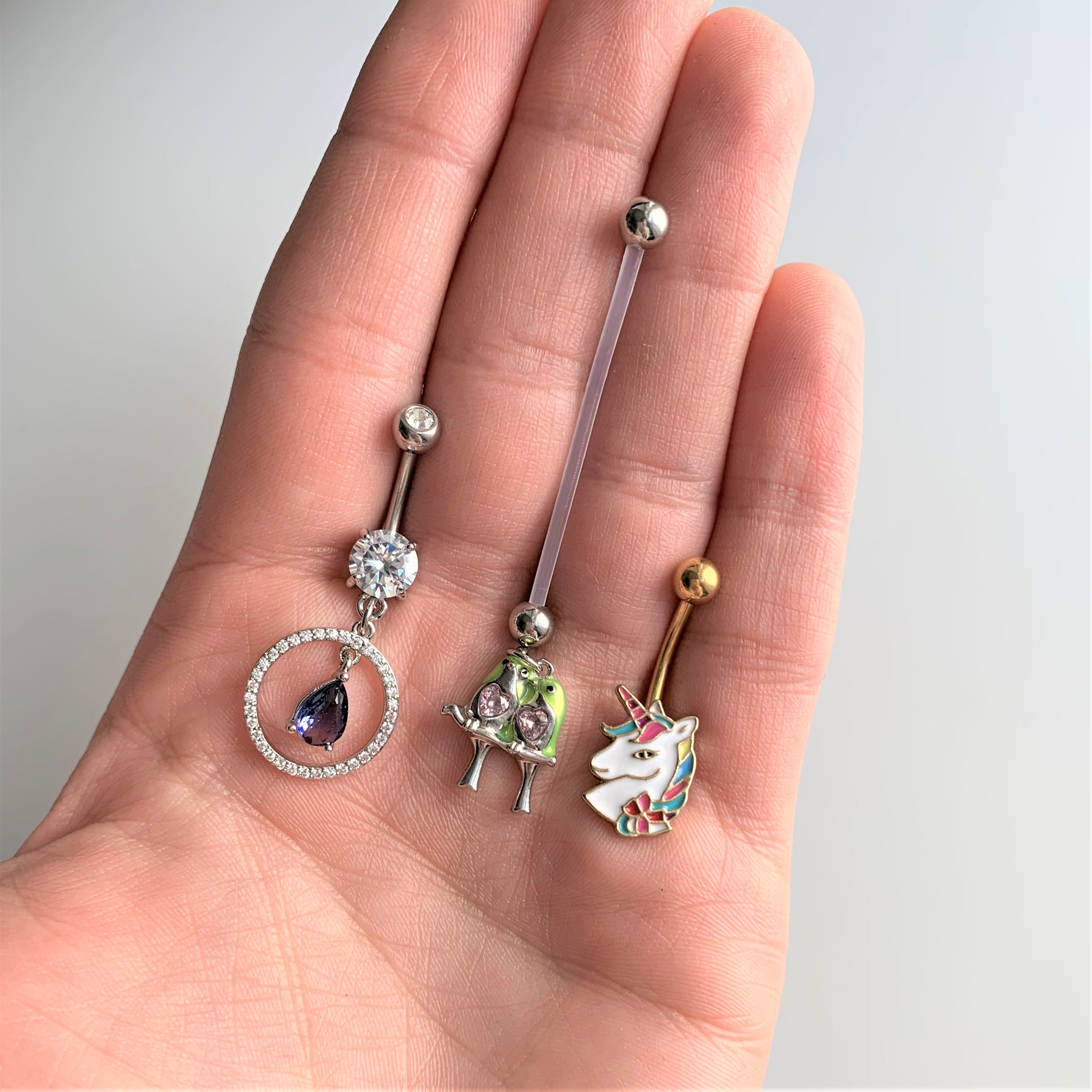 BodyCandy Pink Gem Green Little Lovebirds Twins Dangle Pregnancy Belly Ring — detail close-up