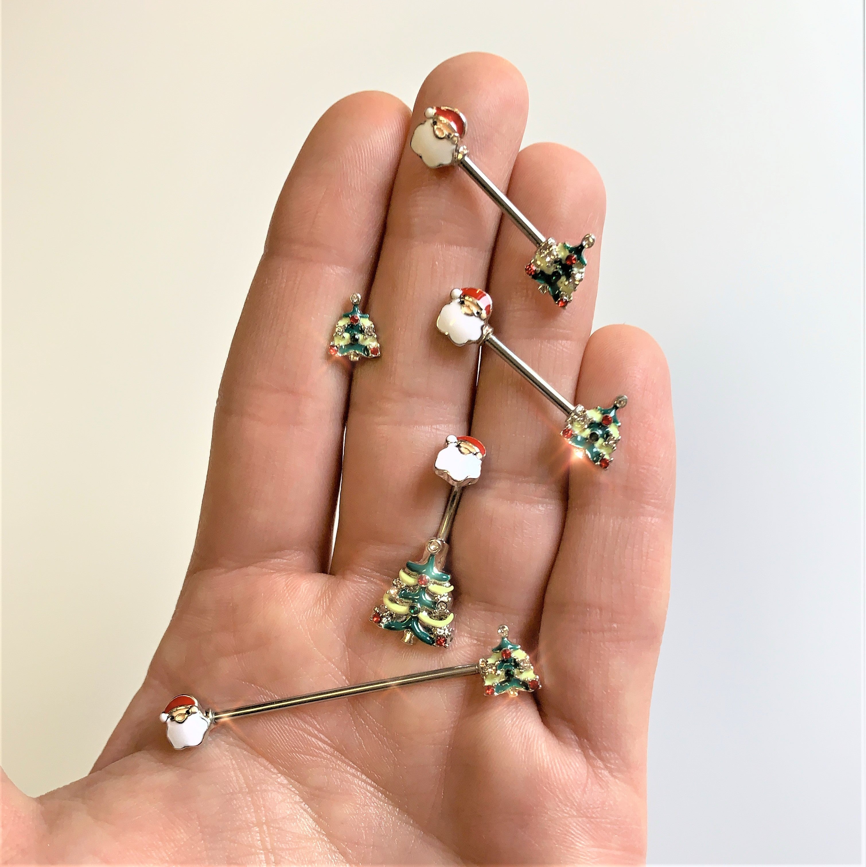 BodyCandy Red Gem Santa Christmas Tree Double Mount Belly Ring — detail close-up