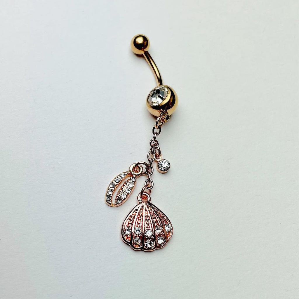 BodyCandy Clear Gem Rose Gold Tone Nautical Shell Dangle Belly Ring — detail close-up
