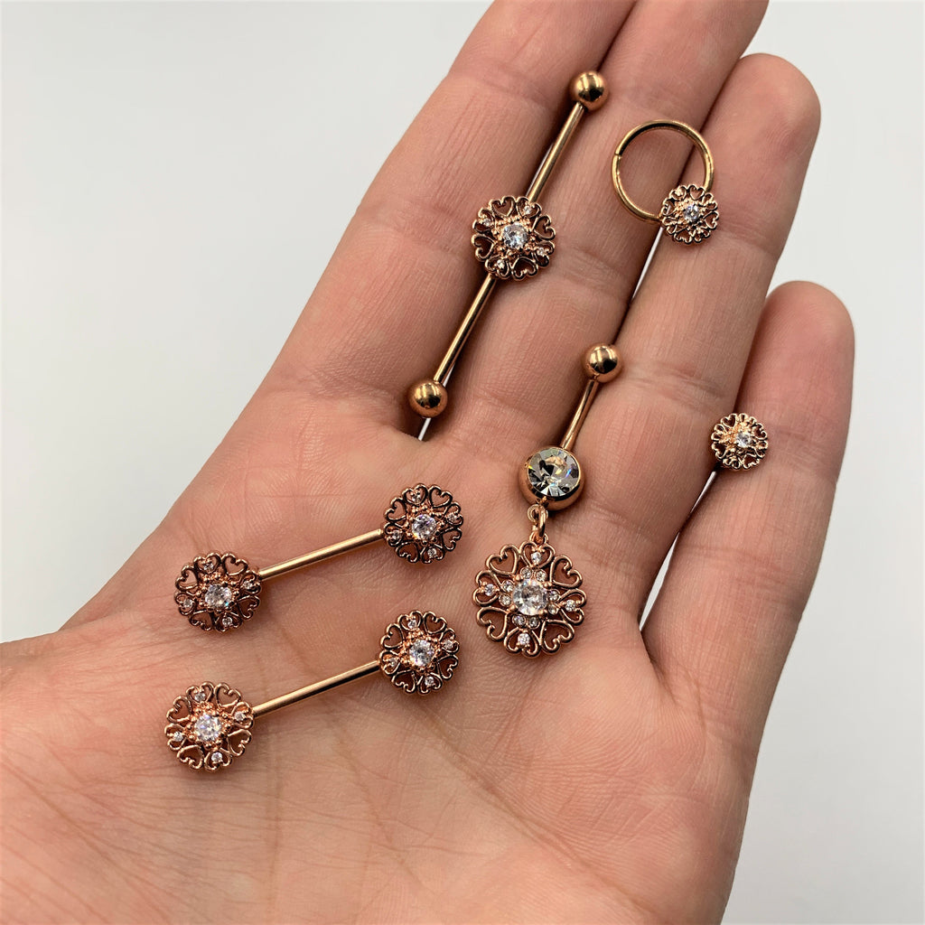 BodyCandy Clear CZ Gem Rose Gold Tone Hearts Dangle Belly Ring — detail close-up