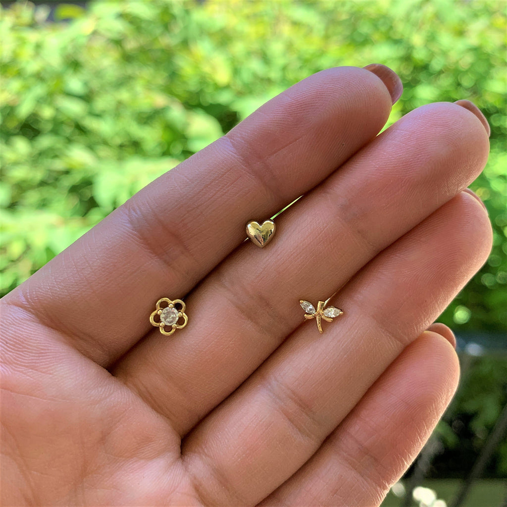BodyCandy 16G 5/16 Clear CZ Gem Gold Tone Heart Labret Tragus Set of 3 — lifestyle context
