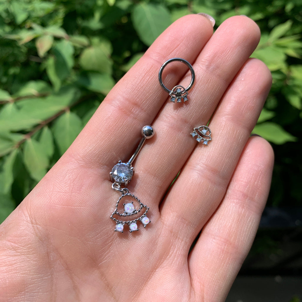 BodyCandy Clear CZ Gem White Faux Opal UFO Dangle Belly Ring — detail close-up