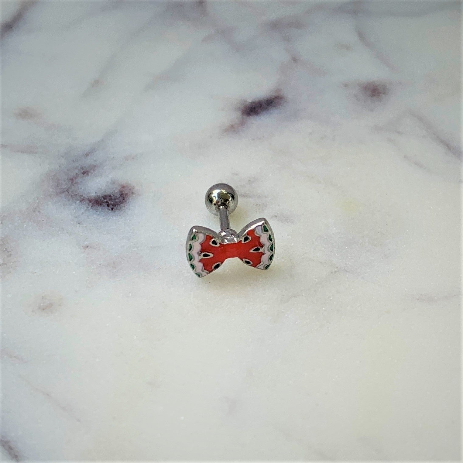 BodyCandy 16G 1/4 Red Fruit Watermelon Bow Cartilage Tragus Earring — detail close-up