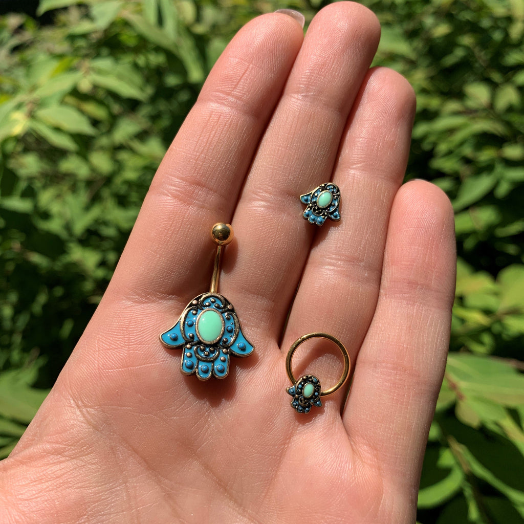 BodyCandy 16G 3/8 Gold Tone Aqua Ornate Hamsa Hand Septum Ring — detail close-up