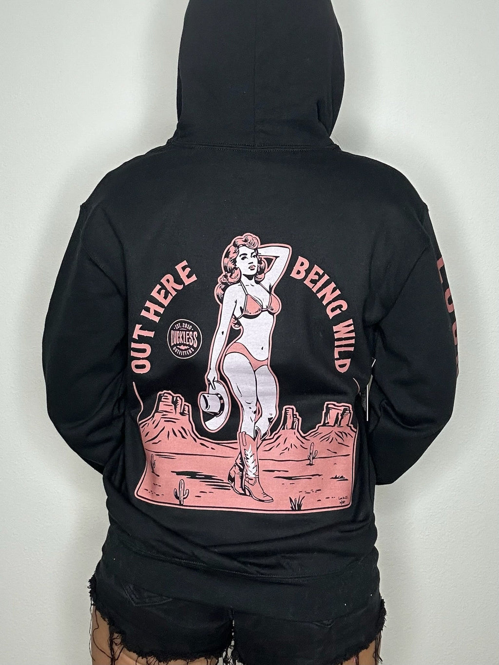 Luckless Outfitters Out Here Being Wild Hoodie in Dusty Coral — side view