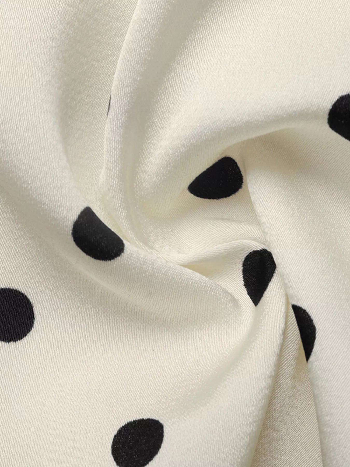 Polka Dot Sleeveless Peplum Blouse