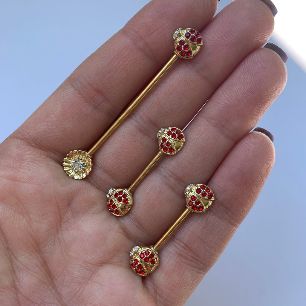 BodyCandy 14G Red Gem Gold Tone Ladybug Flower Industrial Barbell 38mm — lifestyle context