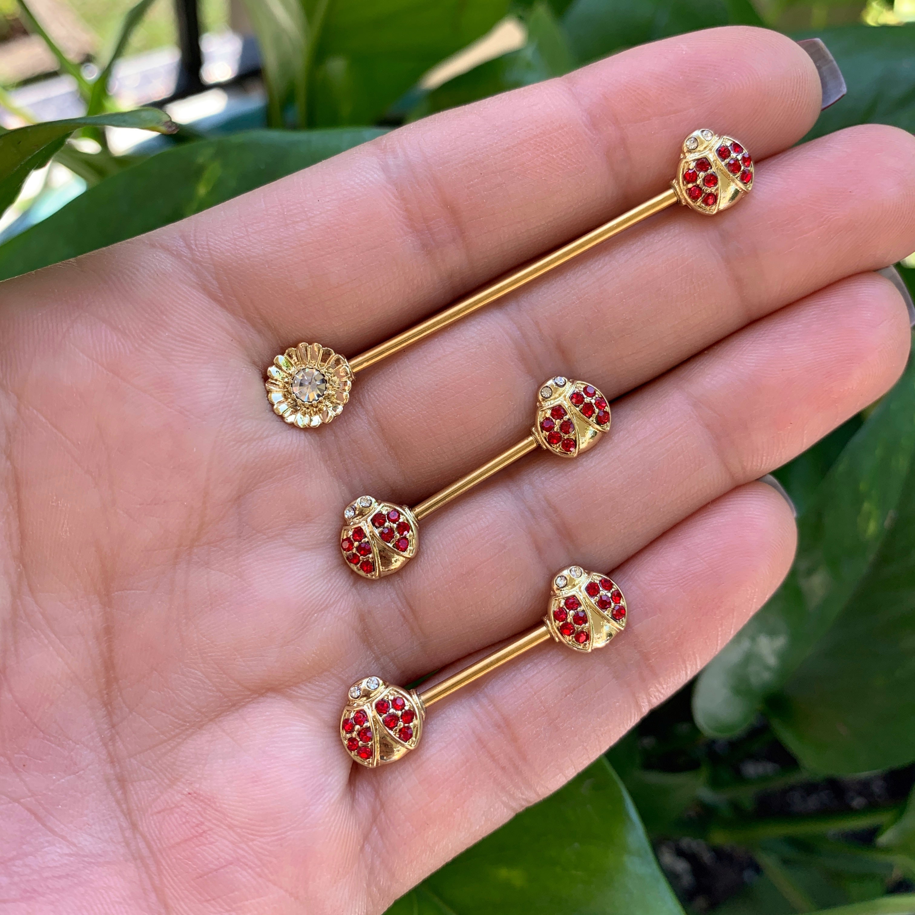 BodyCandy 14G Red Gem Gold Tone Ladybug Flower Industrial Barbell 38mm — detail close-up