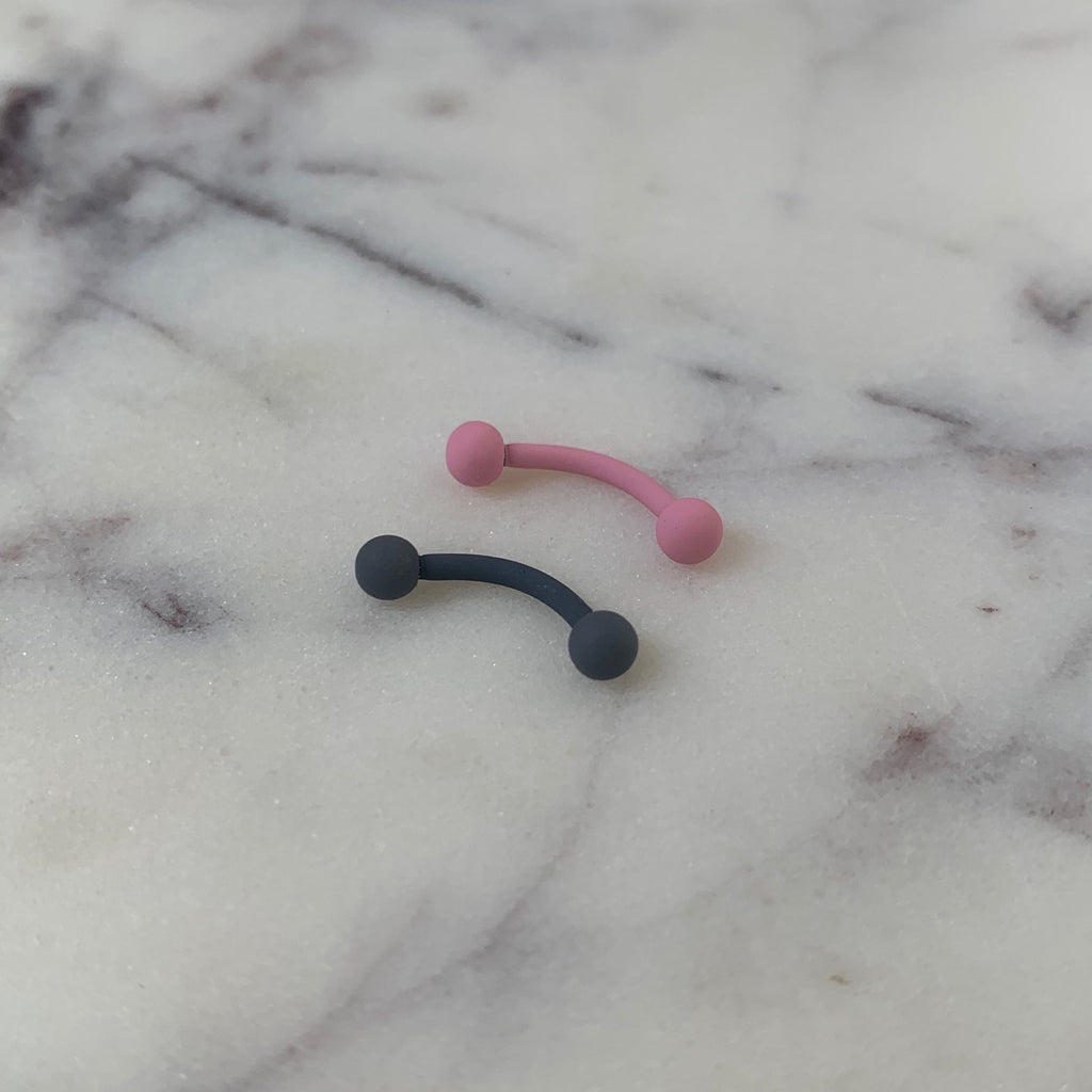 BodyCandy 16G 5/16 Pink Acrylic Matte Curved Eyebrow Ring — detail close-up