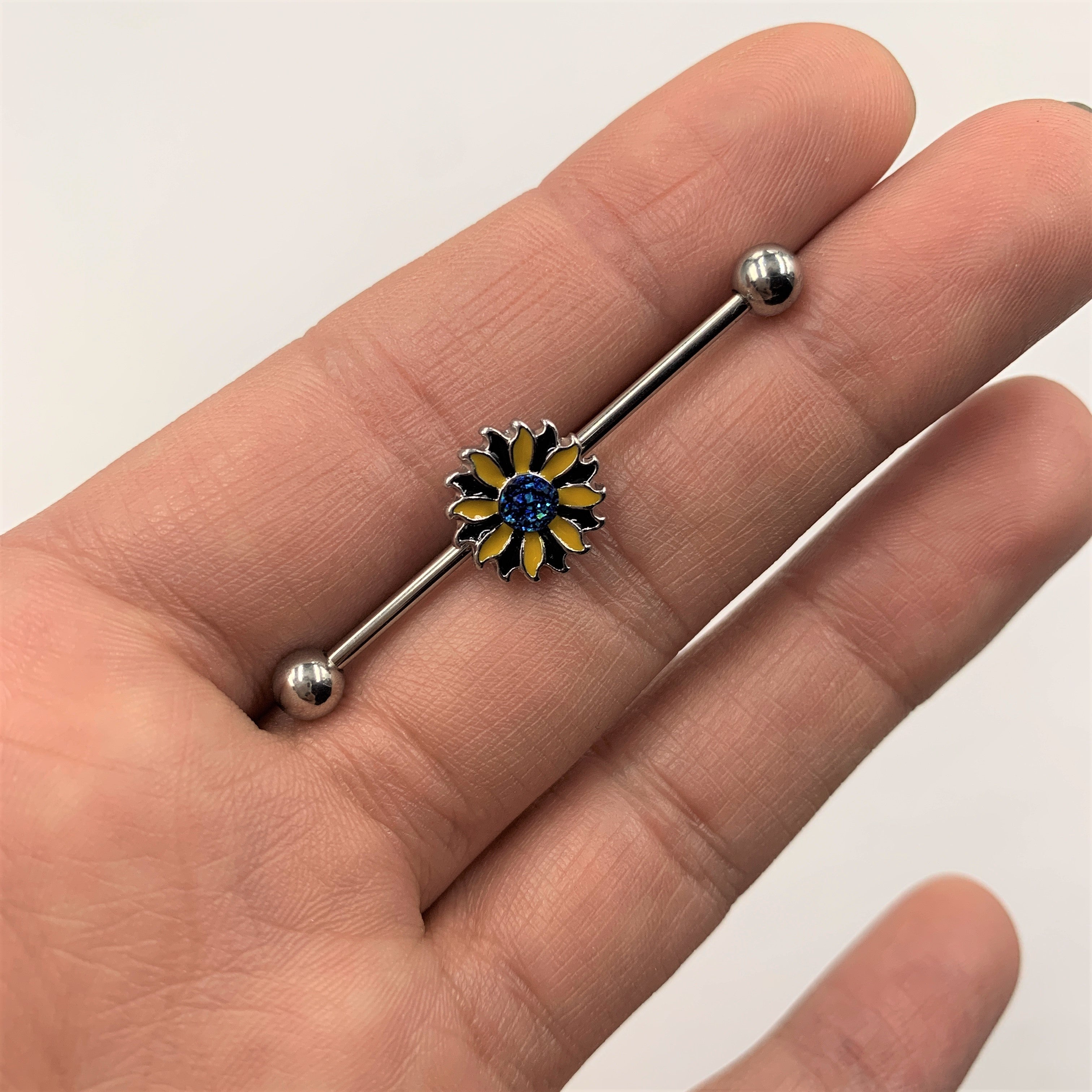 BodyCandy 14G Blue Faux Druzy Yellow Sunflower Industrial Barbell 38mm — detail close-up
