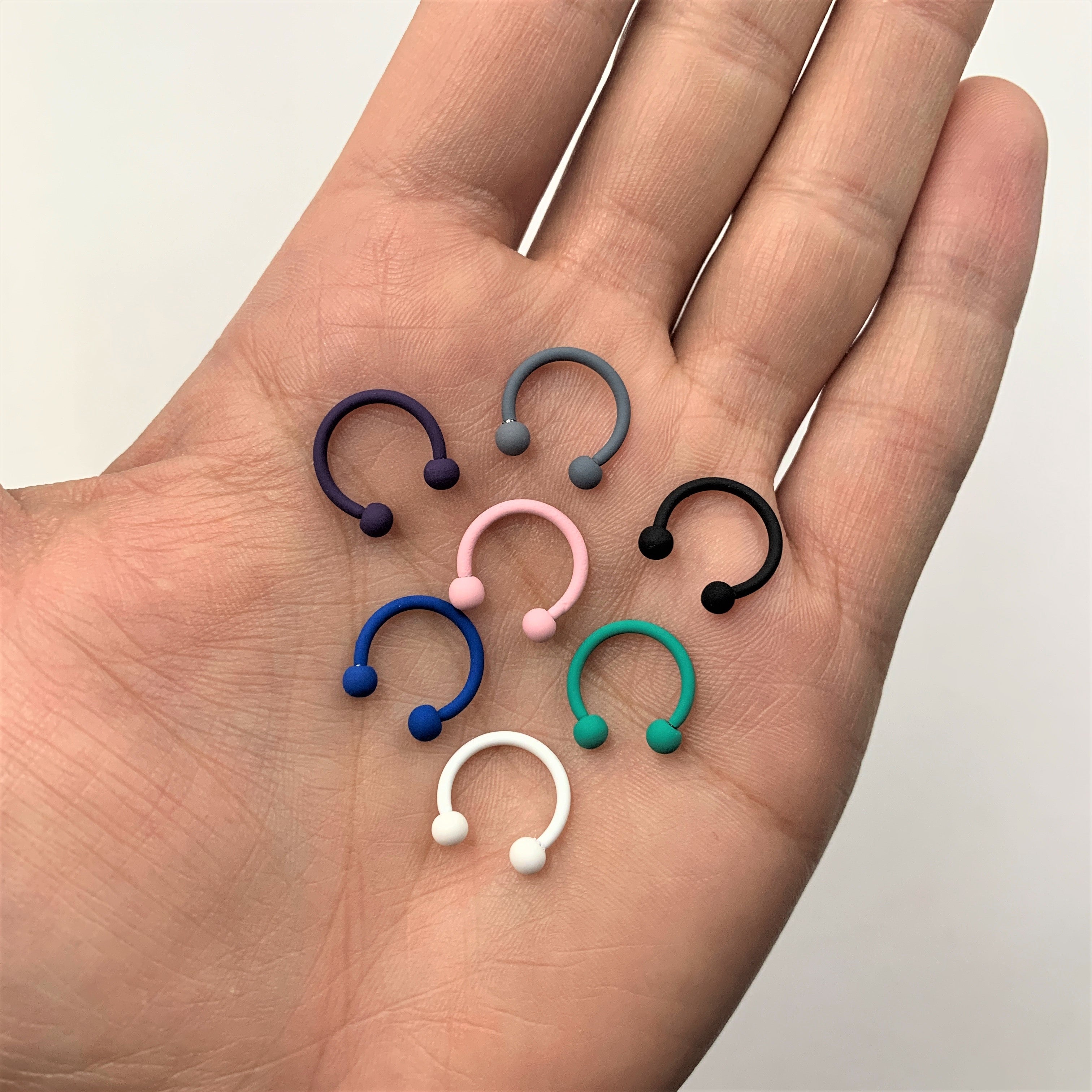 BodyCandy 16G 3/8 White Matte Horseshoe Circular Barbell — detail close-up