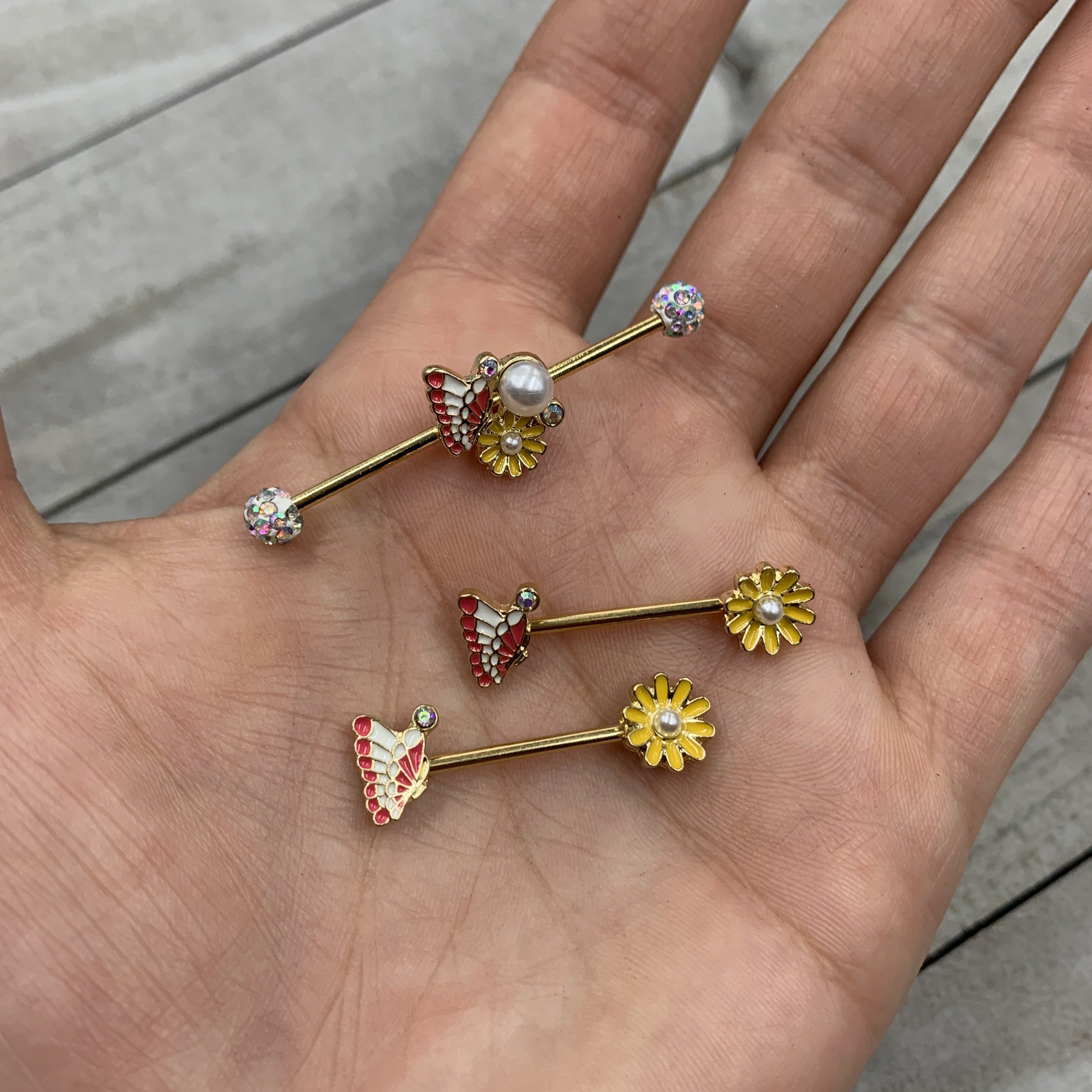 BodyCandy 14G 5/8 Aurora Gem Gold Tone Butterfly Flower Barbell Nipple Ring Set — detail close-up