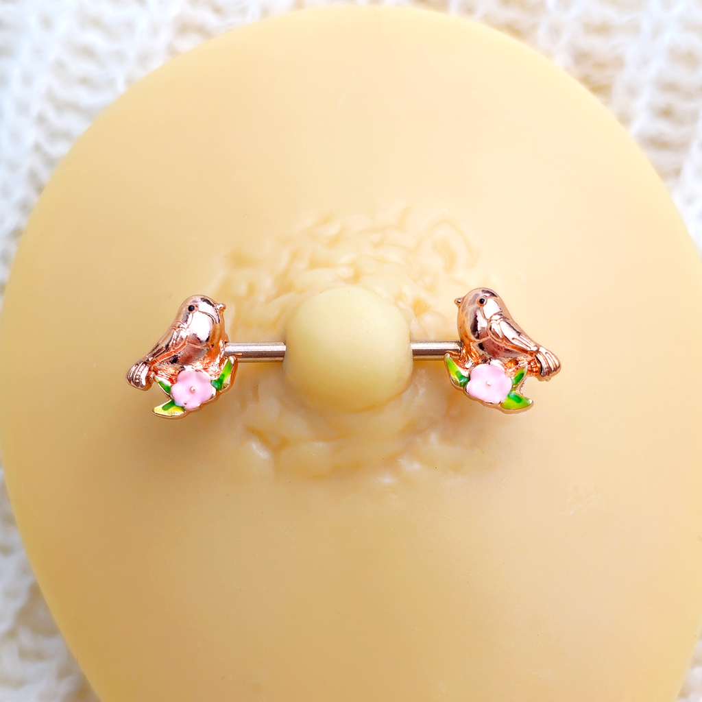 BodyCandy 14G 9/16 Rose Gold Tone Bird Pink Flower Barbell Nipple Ring Set — detail close-up