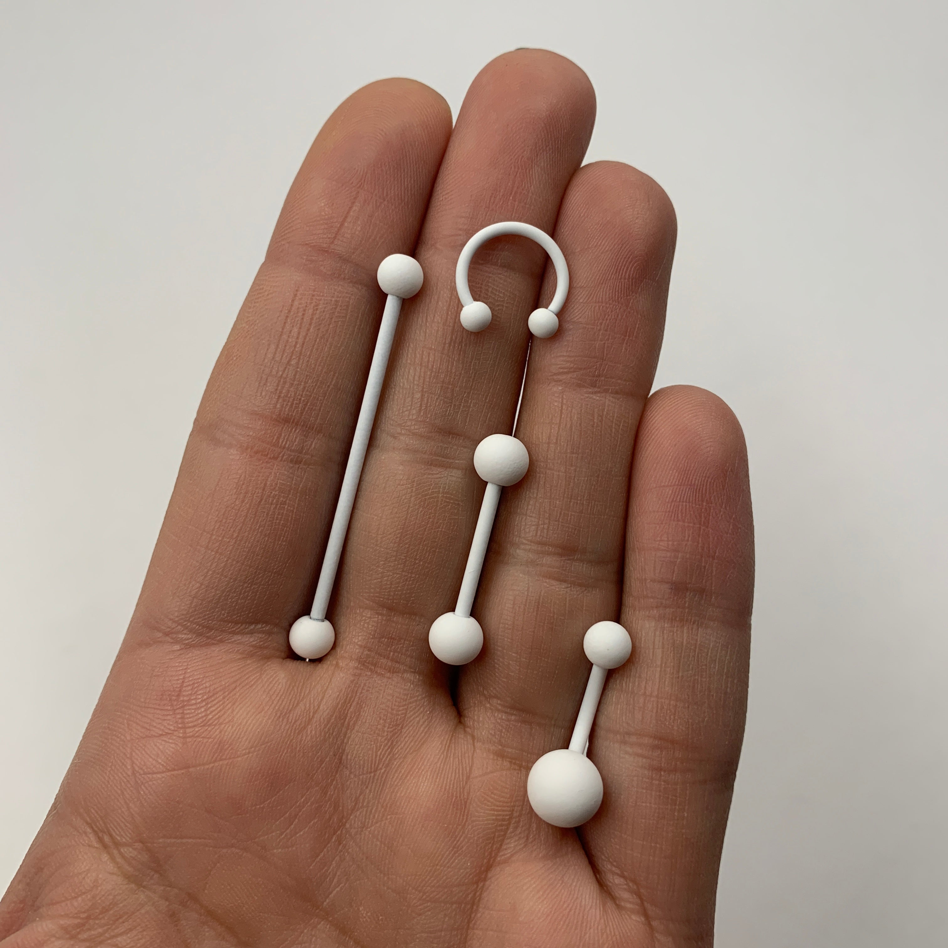 BodyCandy 16G 3/8 White Matte Horseshoe Circular Barbell — side view