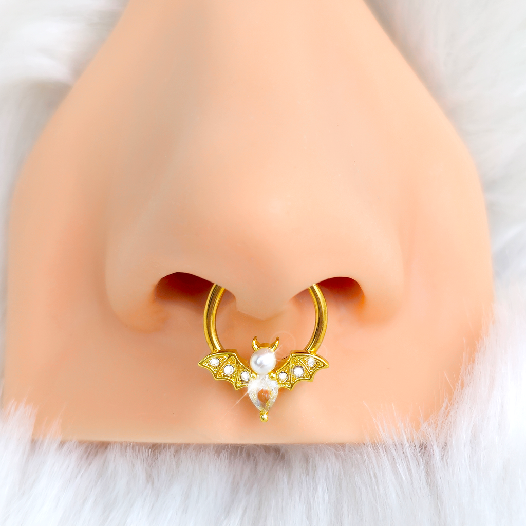 BodyCandy 16G 3/8 Clear Gem Gold Tone Bat Halloween Hinged Segment Ring — detail close-up