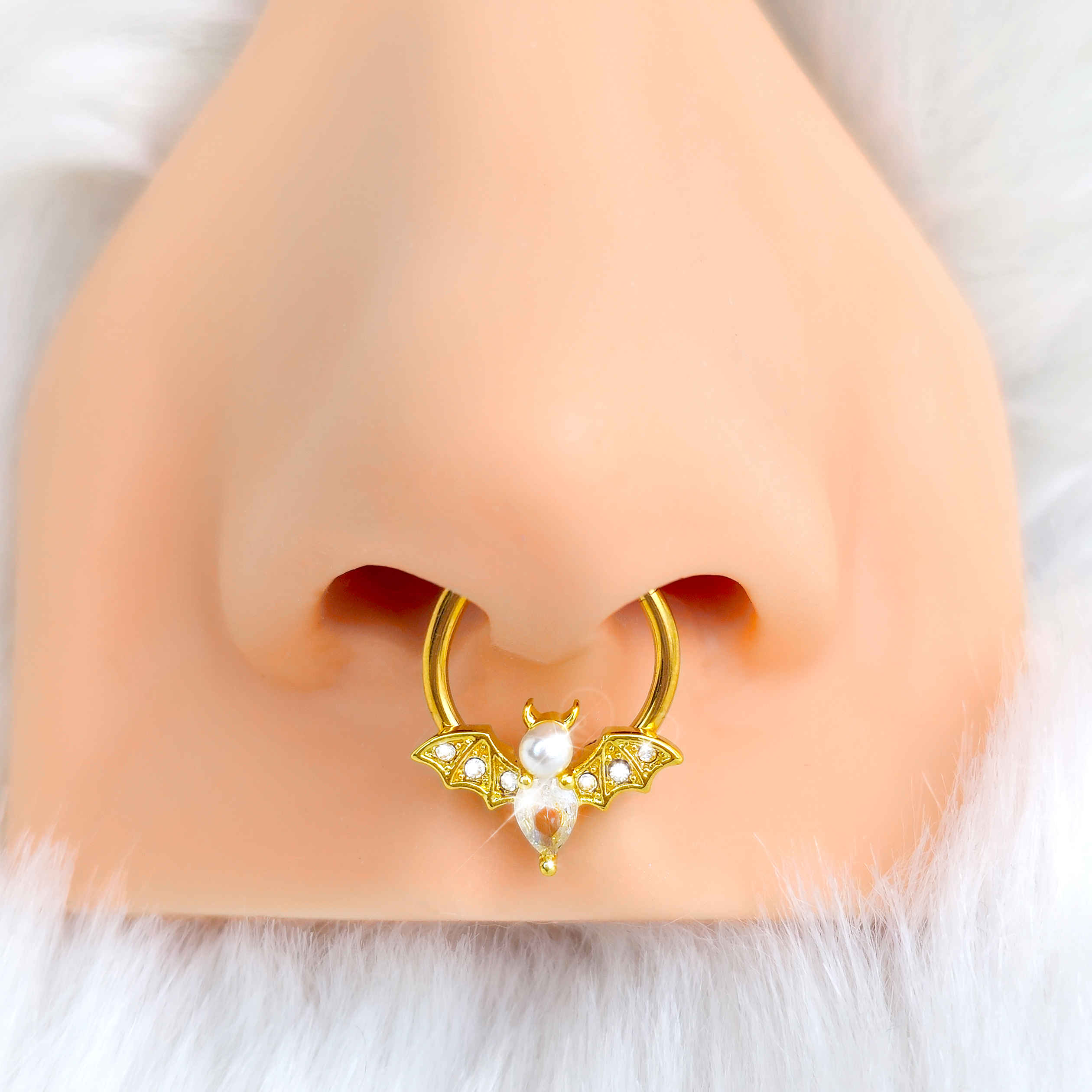 BodyCandy 16G 3/8 Clear Gem Gold Tone Bat Halloween Hinged Segment Ring — detail close-up