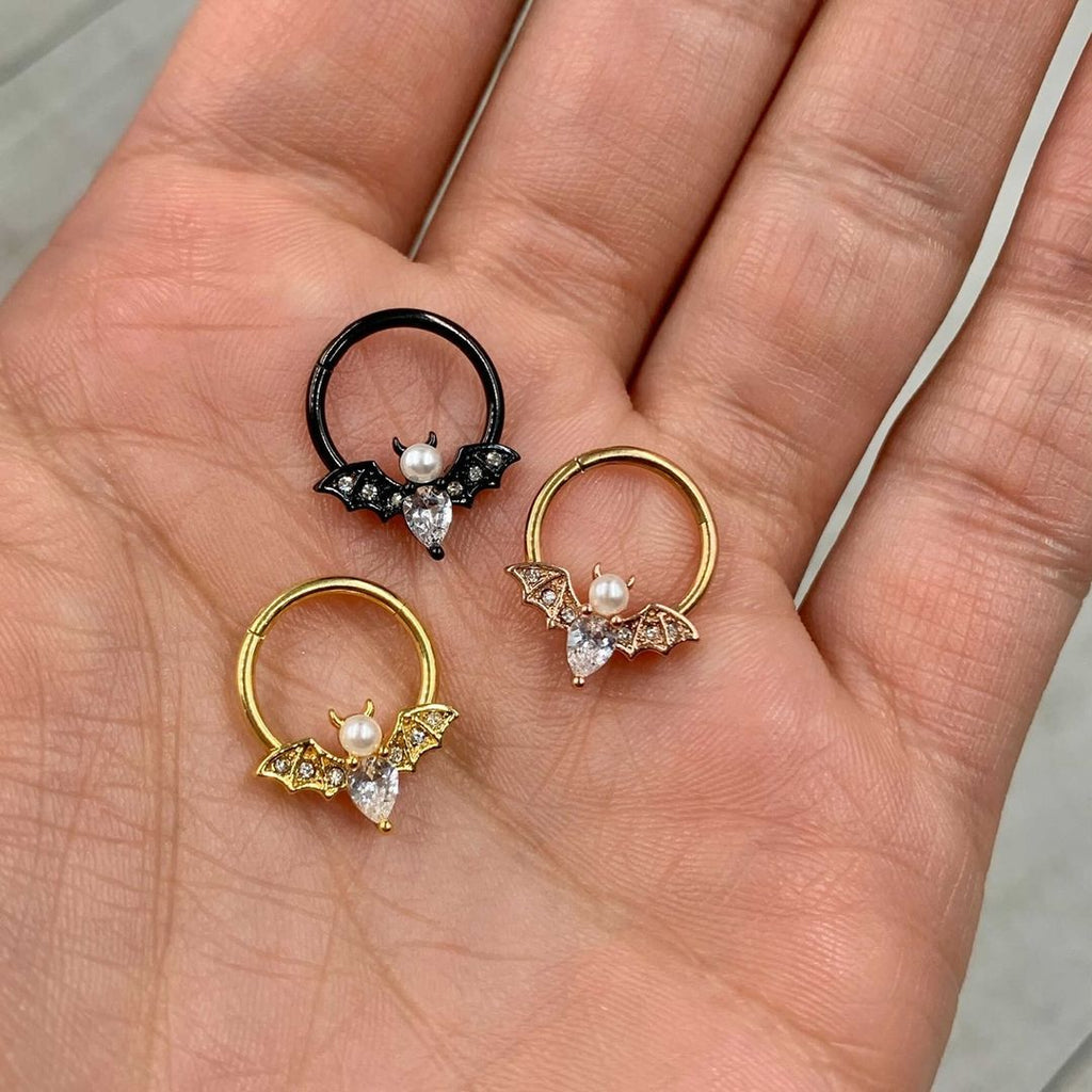 BodyCandy 16G 3/8 Clear Gem Rose Gold Tone Bat Halloween Segment Ring — detail close-up