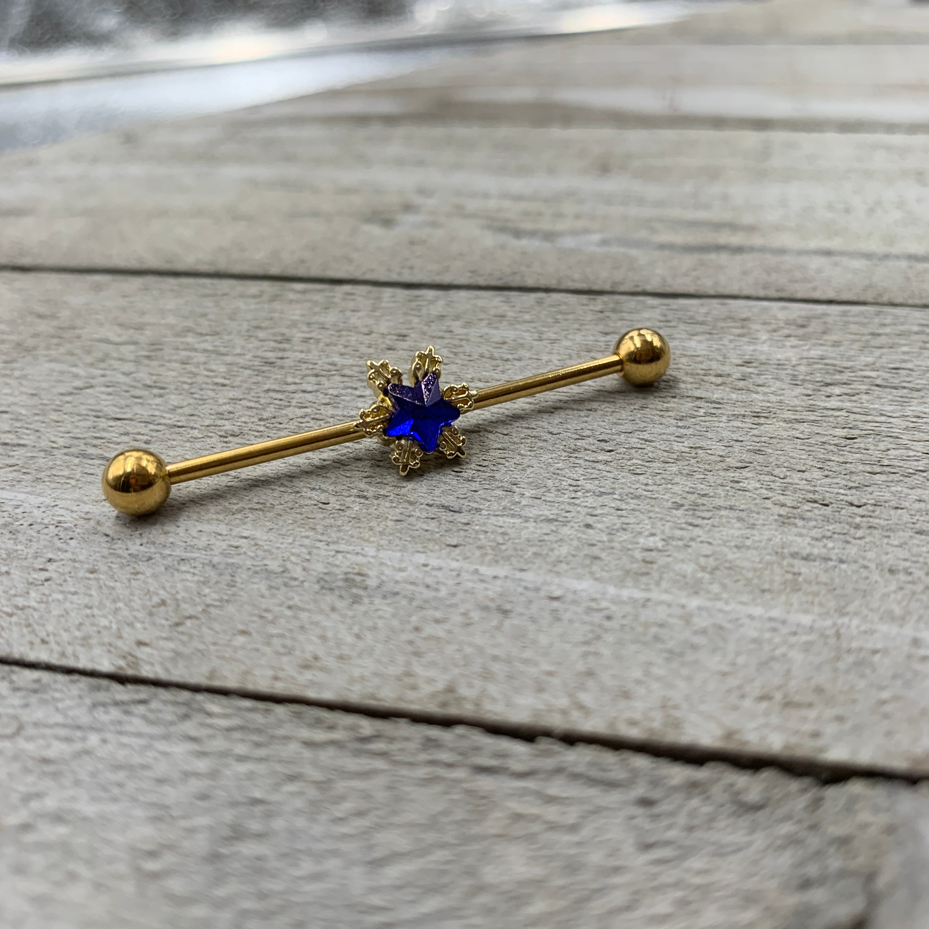 BodyCandy 14G Blue Gem Gold Tone Star Industrial Barbell 38mm — detail close-up