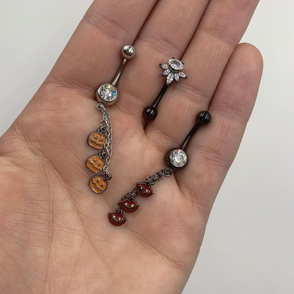 BodyCandy Clear Gem Black Pumpkin Halloween Chain Dangle Belly Ring — detail close-up