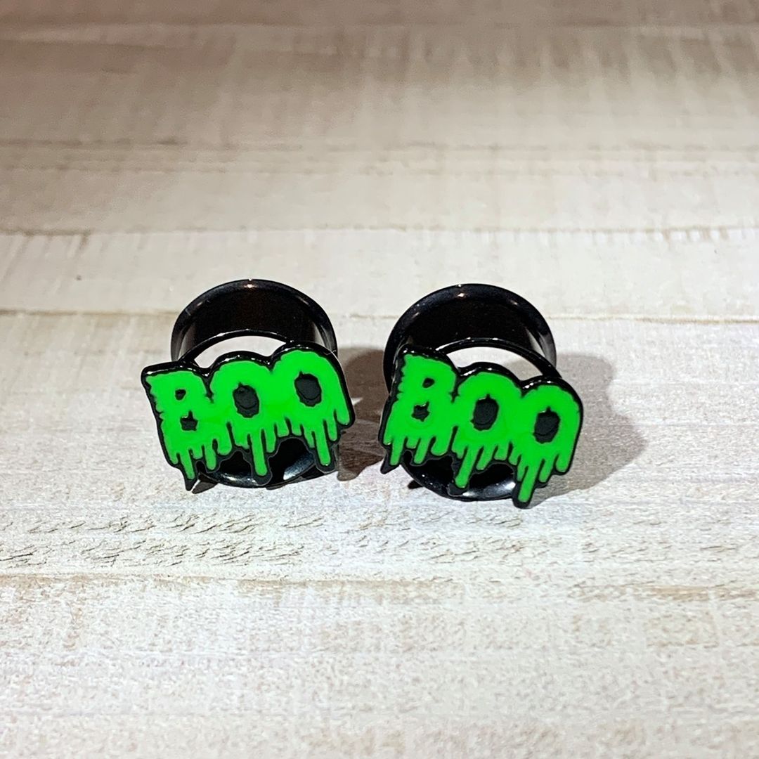 BodyCandy Green Boo Halloween Double Flare Plug Set — detail close-up