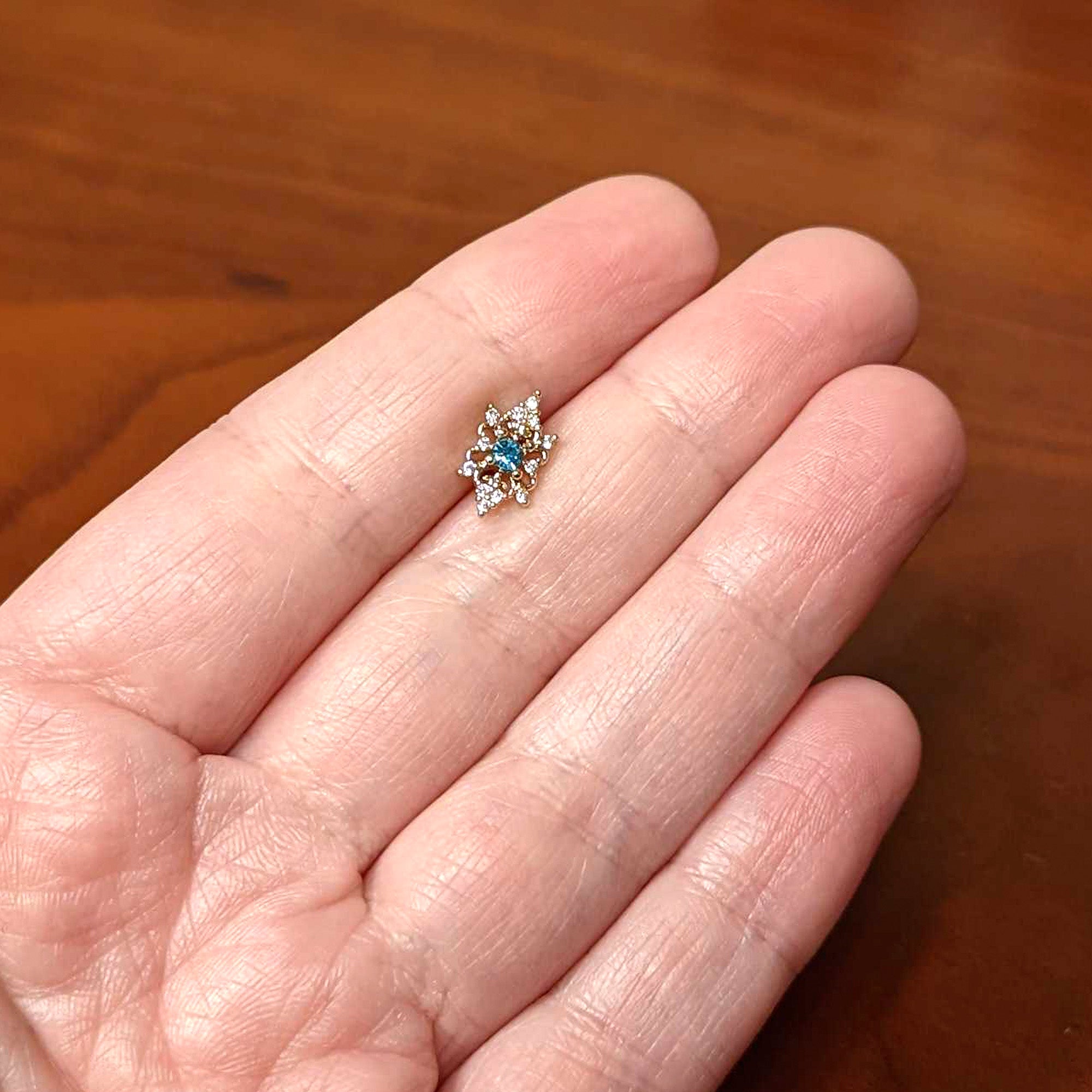 BodyCandy 20G 1/4 Clear Blue Gem Gold Tone Royal Heart Nose Bone — back view
