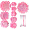 BodyCandy Clear Pink Acrylic Glitter Glam Saddle Plug Set — main product shot