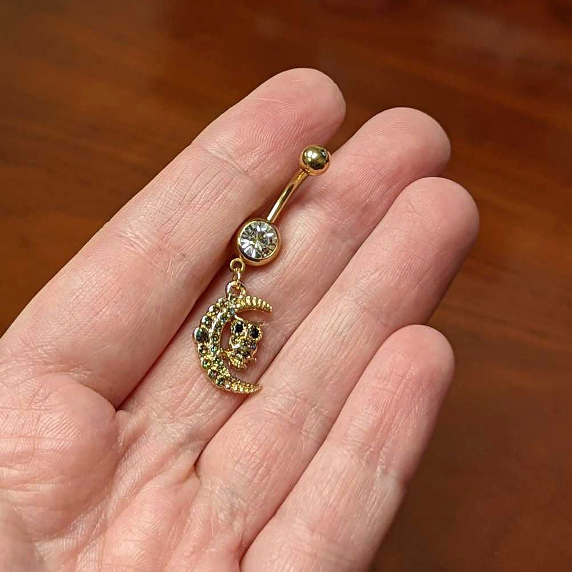 BodyCandy Clear Aurora Black Gem Gold Tone Owl Moon Dangle Belly Ring — lifestyle context