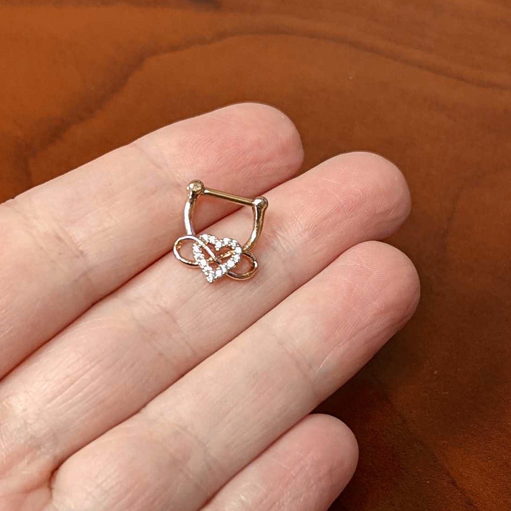 BodyCandy 16G 5/16 Clear CZ Gem Rose Gold Tone Infinity Heart Clicker — side view