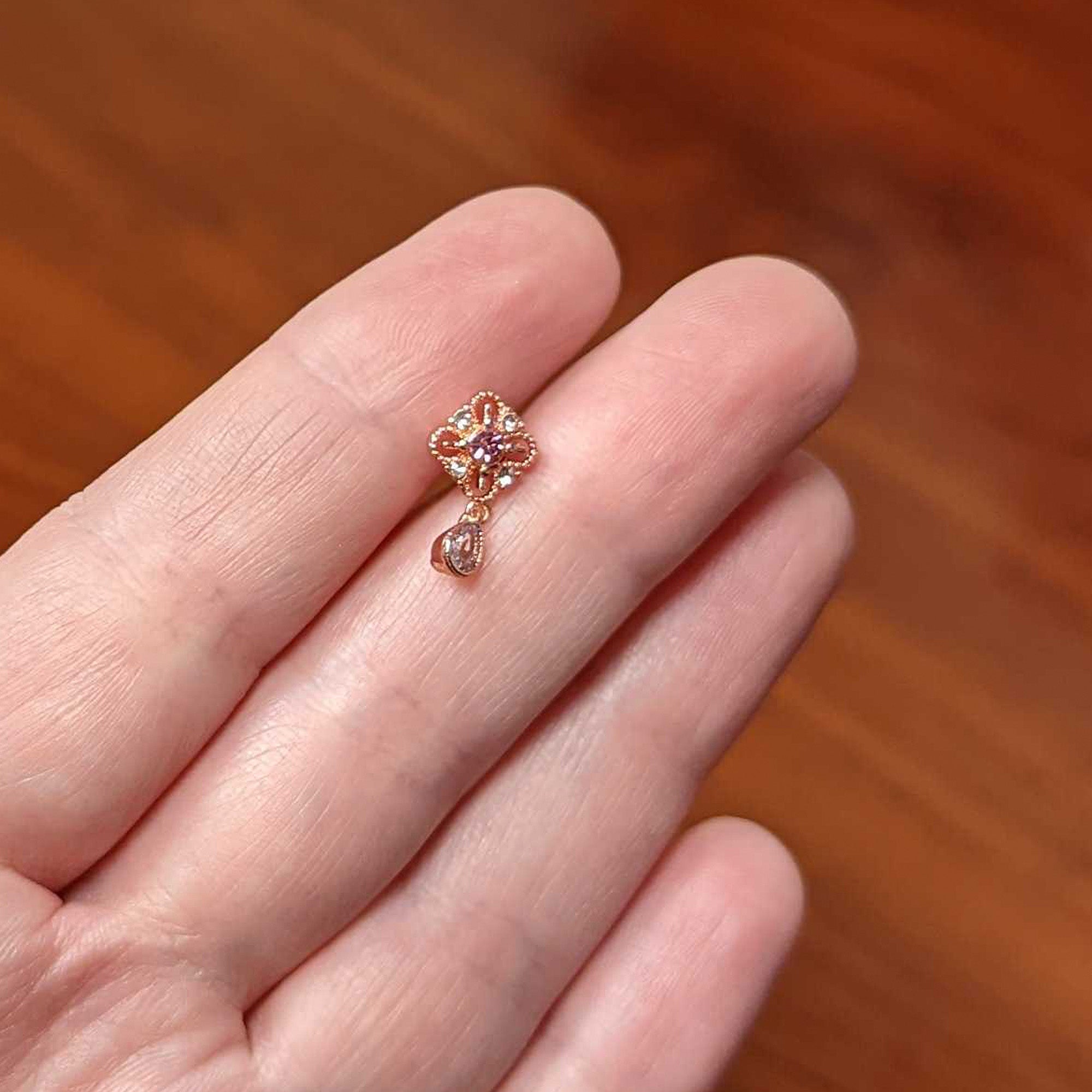 BodyCandy 16G 1/4 Clear Pink Gem Rose Gold Tone Cross Dangle Labret Tragus — back view