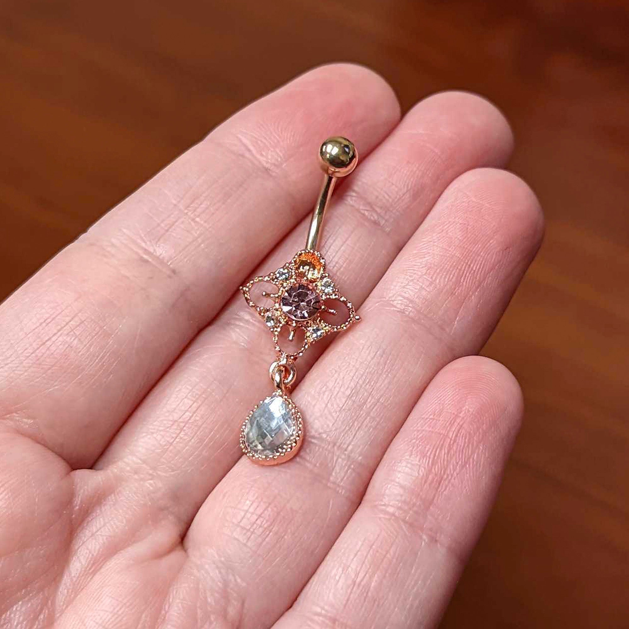 BodyCandy Clear Grey Purple Gem Rose Gold Tone Rhombus Dangle Belly Ring — lifestyle context
