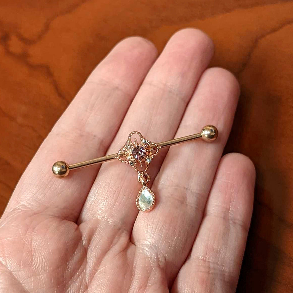 BodyCandy 14G Purple Gem Rose Gold Hue Cross Dangle Industrial Barbell 38mm — lifestyle context