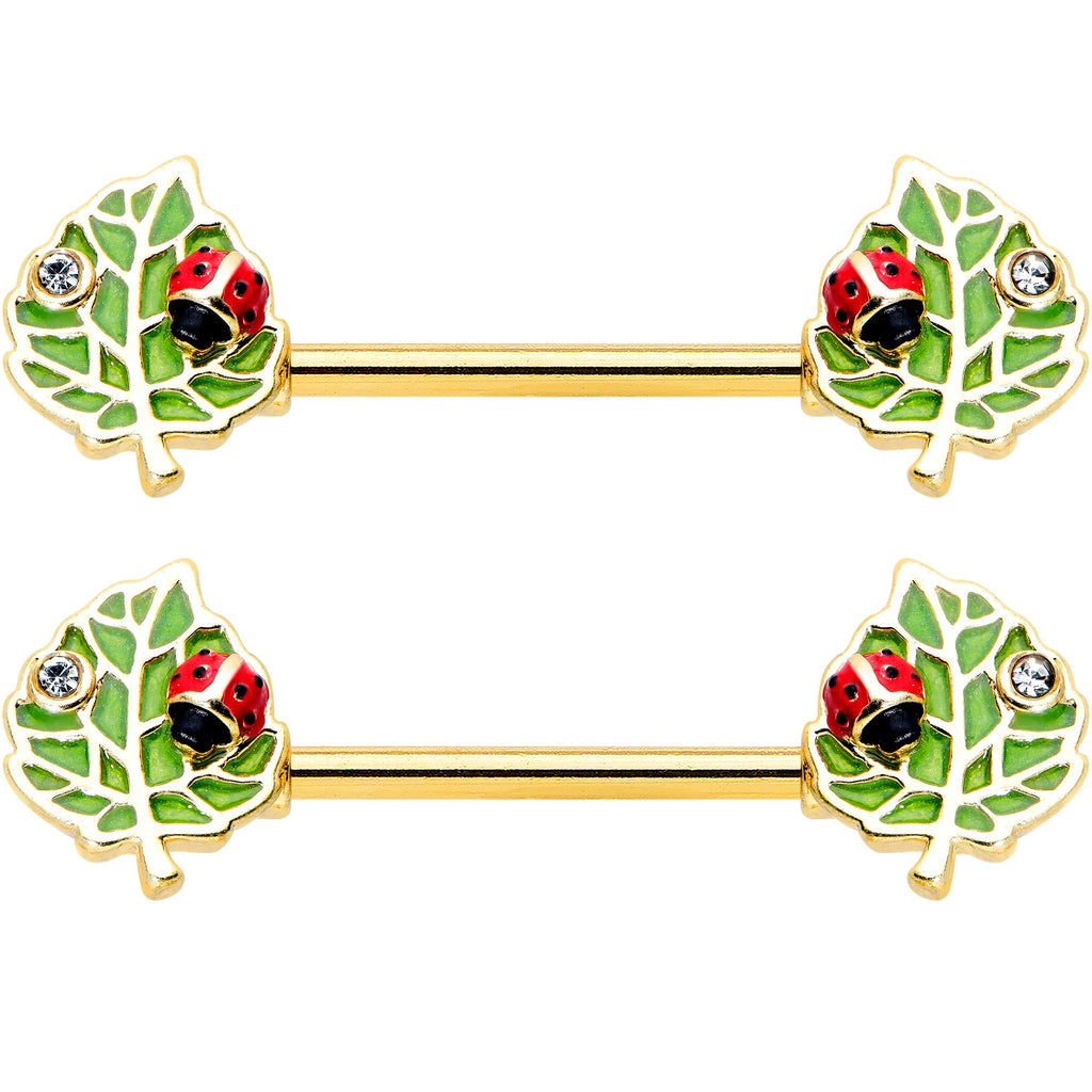 BodyCandy 14G 9/16 Clear Gem Gold Hue Leafy Ladybug Barbell Nipple Ring Set — detail close-up
