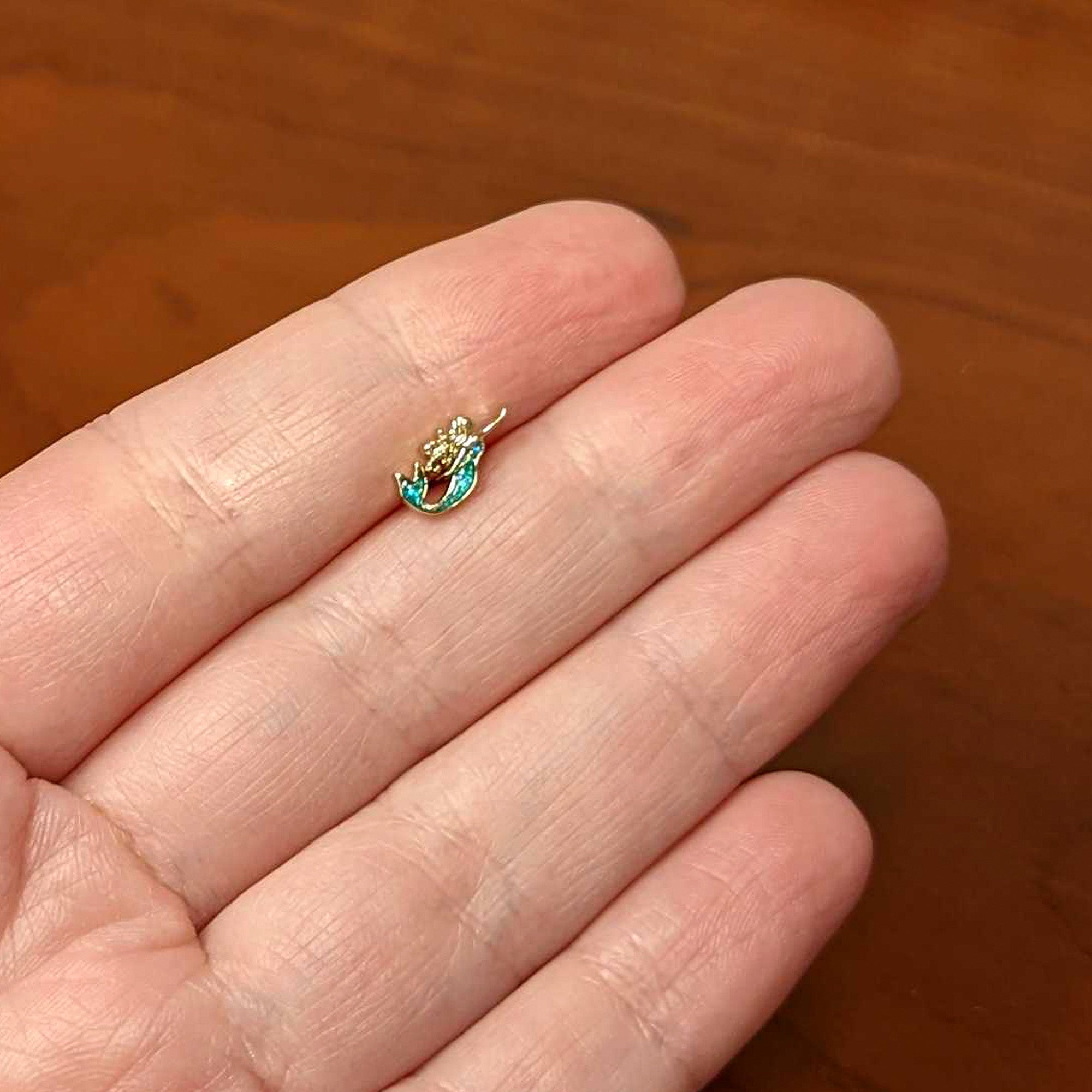 BodyCandy 16G 1/4 Green Faux Opal Gold Hue Curvy Mermaid Cartilage Tragus — back view