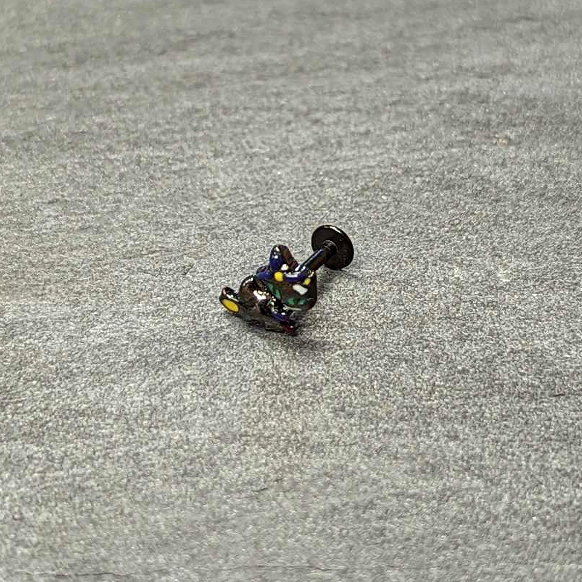 BodyCandy 16G 1/4 Black Witch Cat Halloween Labret Monroe Tragus — in-use photo