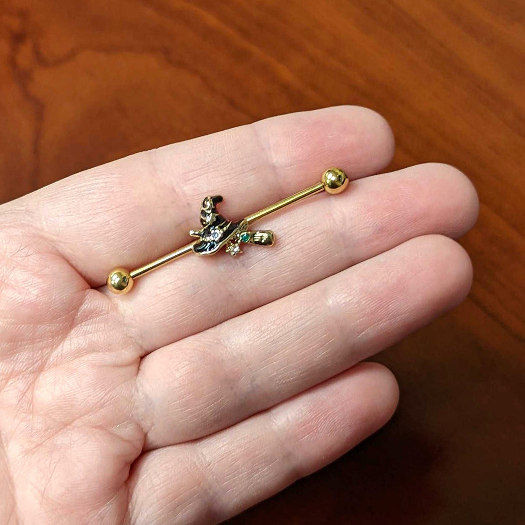 BodyCandy 14G Clear Gem Gold Tone Witch Hat Broom Industrial Barbell 38mm — lifestyle context