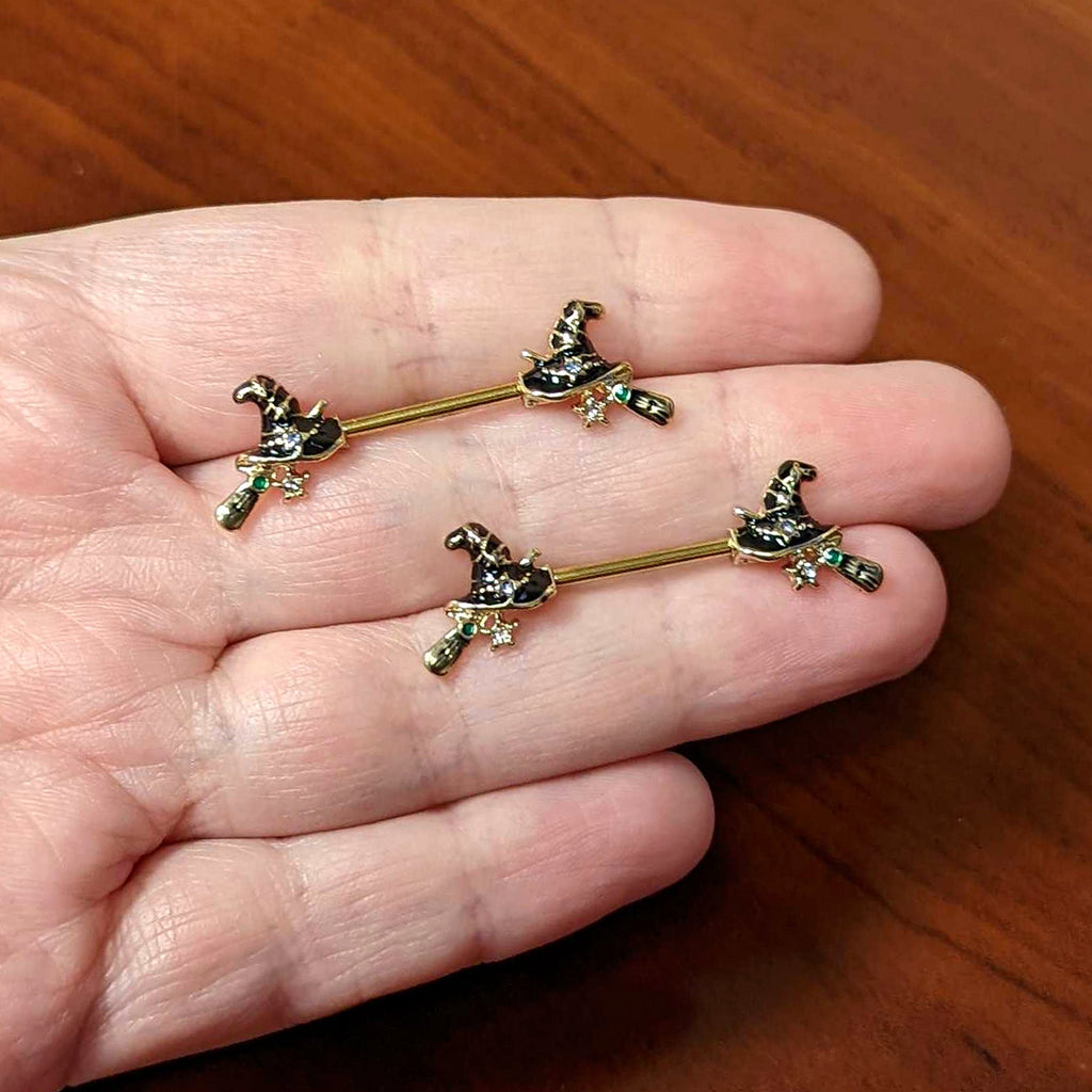 BodyCandy 14G 9/16 Clear Gem Gold Tone Witch Hat Broom Nipple Ring Set — side view
