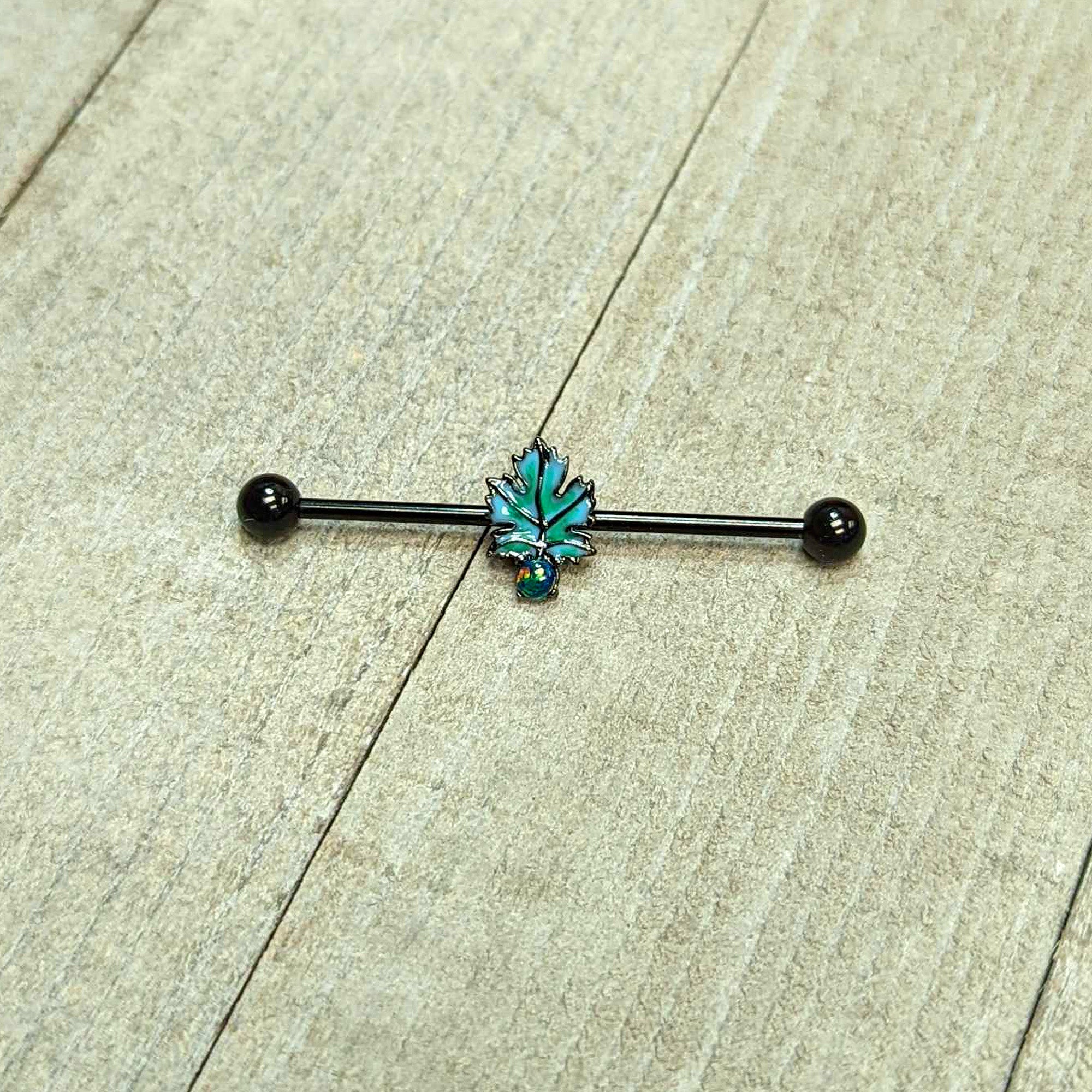 BodyCandy 14G Green Synthetic Opal Black Fall Leaf Industrial Barbell 38mm — in-use photo