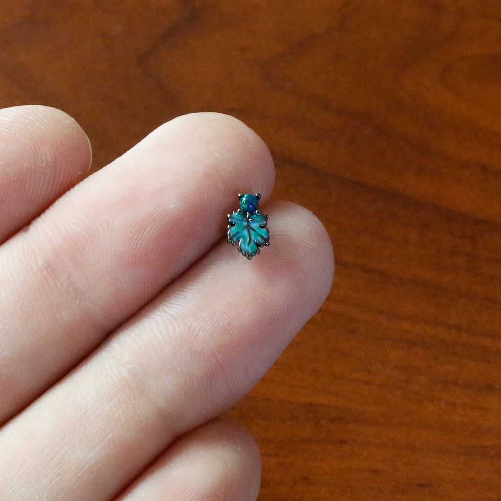 BodyCandy 20G 1/4 Green Synthetic Opal Fall Leaf Nose Bone — in-use photo