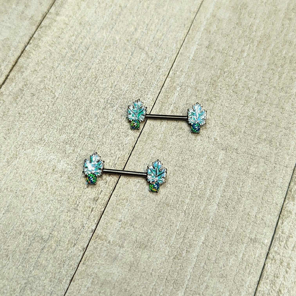 BodyCandy 14G 1/2 Green Synthetic Opal Black Fall Leaf Nipple Ring Set — in-use photo