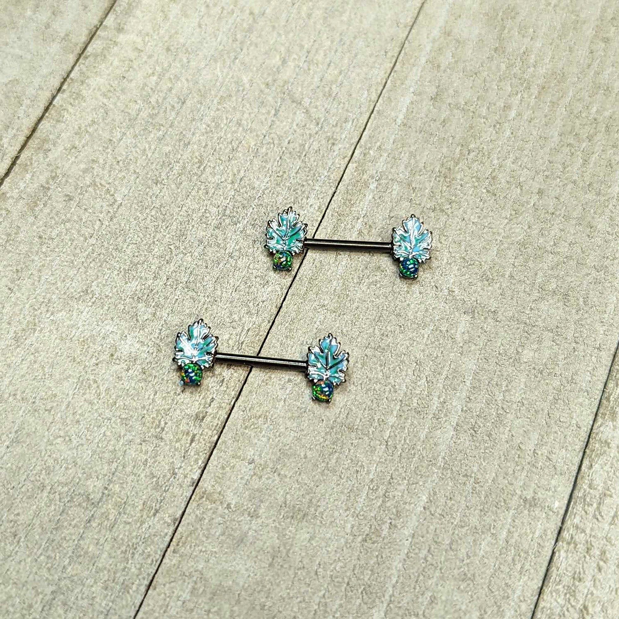 BodyCandy 14G 1/2 Green Synthetic Opal Black Fall Leaf Nipple Ring Set — in-use photo