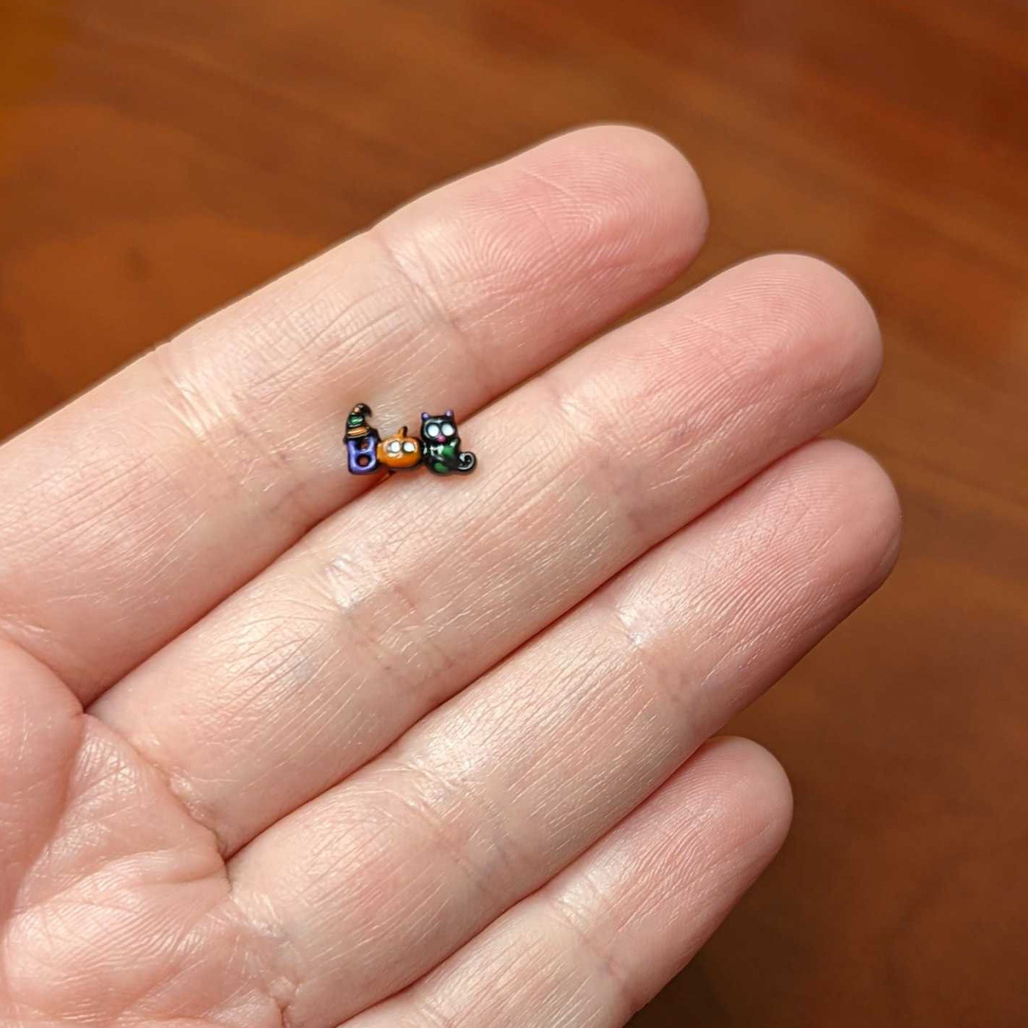 BodyCandy 16G 1/4 Black Boo Party Halloween Cartilage Tragus Earring — back view