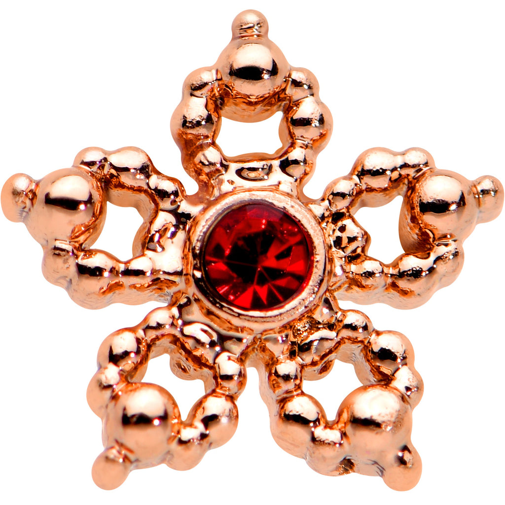BodyCandy 20G 1/4 Red Gem Rose Gold Tone Textured Snowflake Nose Bone — detail close-up