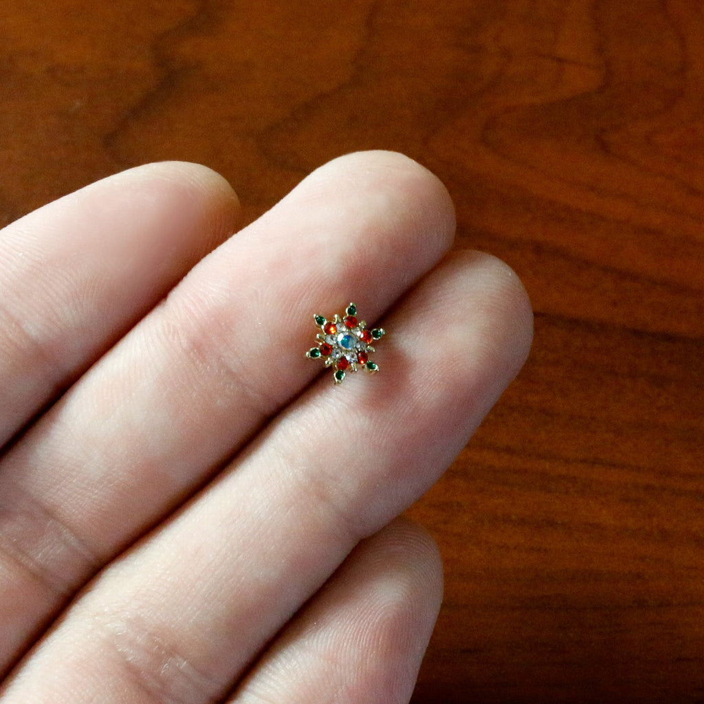 BodyCandy 20G 7mm Aurora Gem Gold Tone Christmas Star L Shape Nose Ring — in-use photo