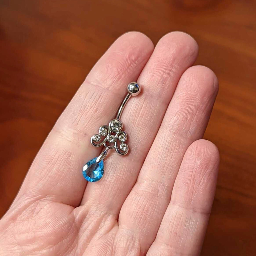 BodyCandy Clear Blue Gem Scrolling Elegance Dangle Belly Ring — lifestyle context